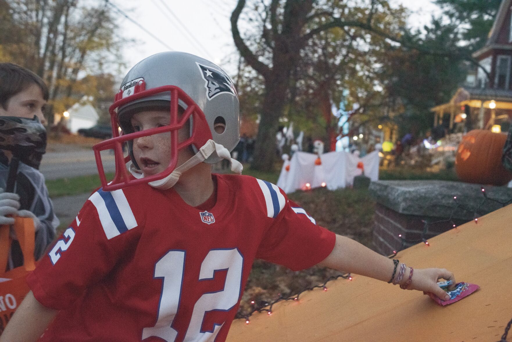 Trick-or-treaters take advantage of warm Halloween night to show off their costumes, collect candy